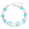 Chaine de cheville argentée ou dorée triple chainage avec perles turquoises